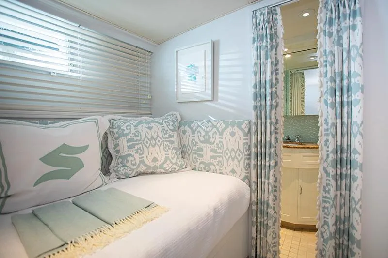 Slide: The Image of Cozy twin bedroom on 1966 Burger Classic yacht with floral bedding and ensuite bathroom. - 25