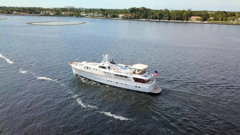 Slide: The Image of Luxurious interior of a 1966 Burger Classic yacht with elegant seating and ocean view. - 3