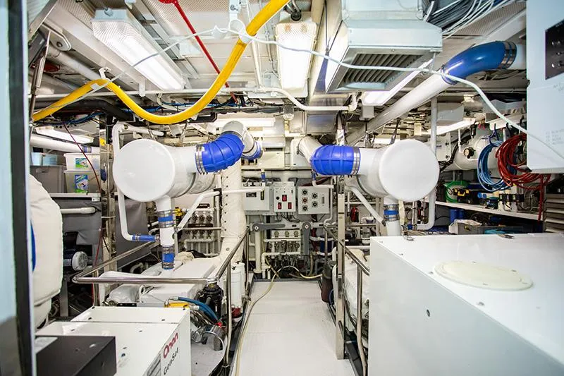 Slide: The Image of Engine room of a 1966 Burger Classic yacht with Onan generator and ventilation system. - 37