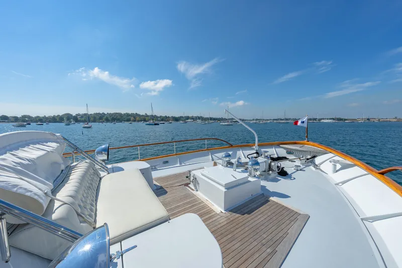 Slide: The Image of Luxurious 1966 Burger Classic yacht deck with scenic ocean view and clear blue sky. - 44