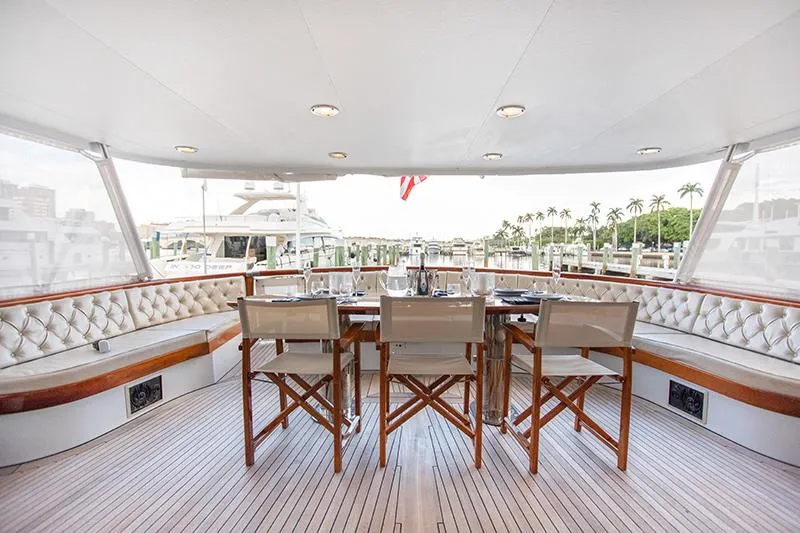 Slide: The Image of Luxurious interior of a 1966 Burger Classic yacht with modern furnishings and ocean views. - 5