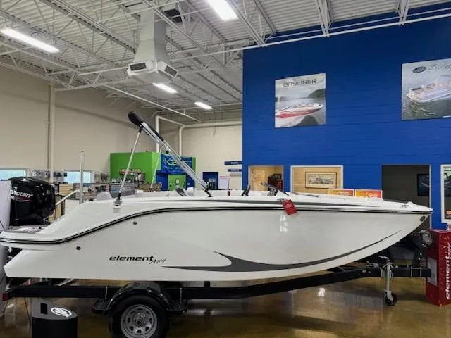 Slide: The Image of 2023 Bayliner Element M19 boat on display in showroom. - 0