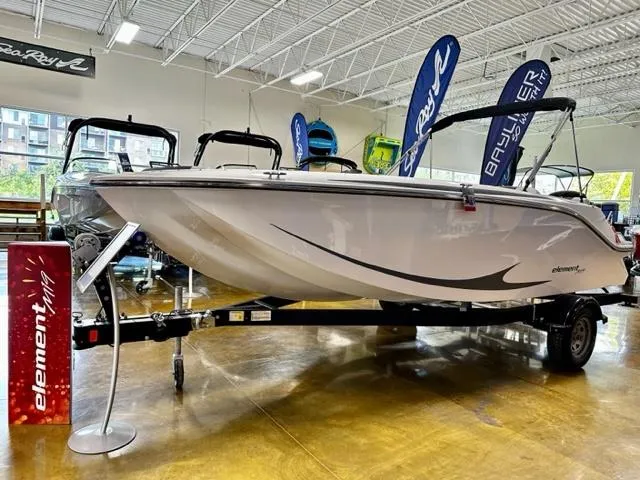 Slide: The Image of 2023 Bayliner Element M19 boat on display in showroom. - 1