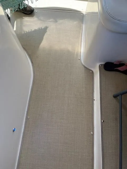 Slide: The Image of Interior deck of a 2005 Rinker Fiesta Vee 320 boat. - 11