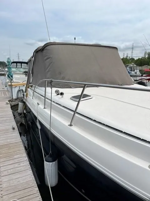 Slide: The Image of 2005 Rinker Fiesta Vee 320 docked at marina. - 12