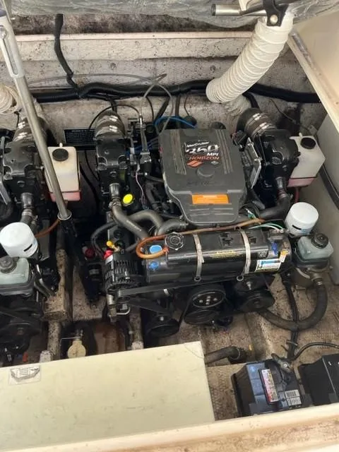 Slide: The Image of Engine compartment of a 2005 Rinker Fiesta Vee 320 boat. - 13