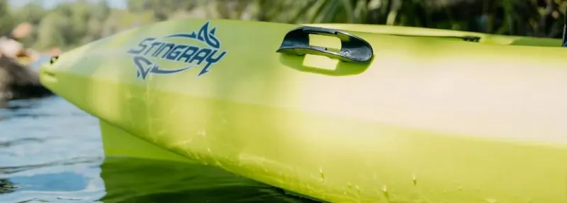 Slide: The Image of Close-up of 2023 Liquidlogic Stingray 11.5 kayak on water. - 3