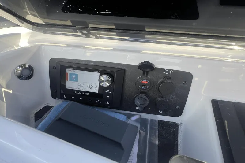 Slide: The Image of 2024 Nautique Super Air Nautique GS24 audio control panel with JL Audio system. - 3