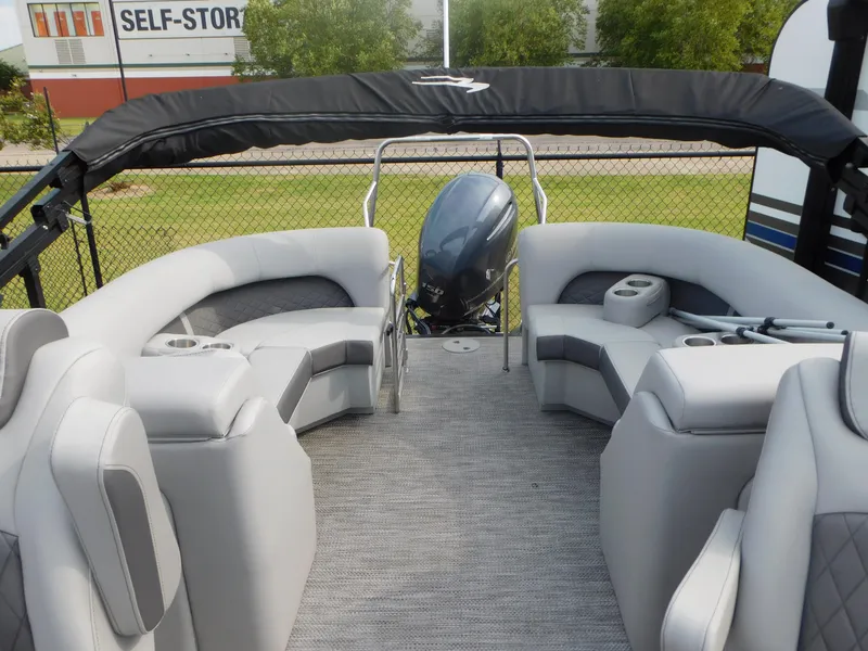 Slide: The Image of 2023 Bennington 23LFB pontoon boat with spacious seating and modern design. - 10