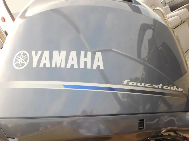 Slide: The Image of Yamaha four-stroke engine on 2023 Bennington 23LFB boat. - 12