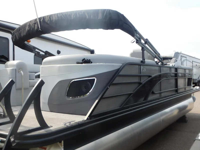 Slide: The Image of 2023 Bennington 23LFB pontoon boat with sleek design and modern features. - 3