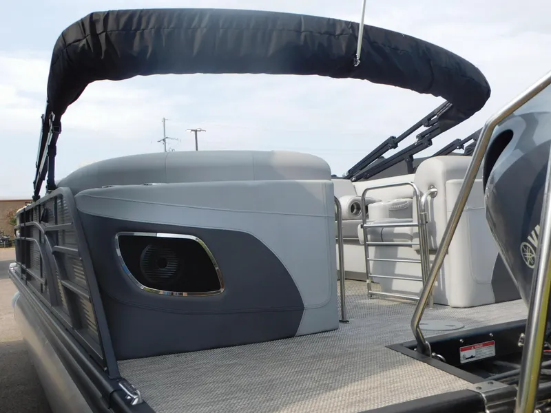 Slide: The Image of 2023 Bennington 23LFB pontoon boat with sleek design and spacious seating. - 4