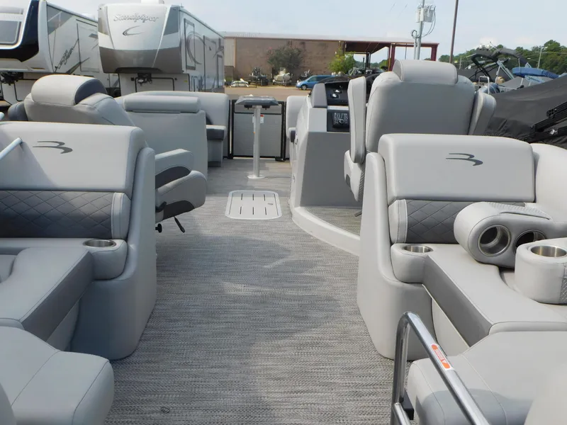 Slide: The Image of 2023 Bennington 23LFB pontoon boat interior with luxurious seating and modern design. - 5