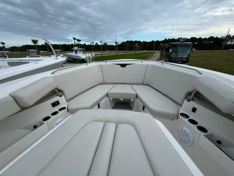 Slide: The Image of 2024 Sailfish 360 CC boat interior with spacious seating and modern design. - 13