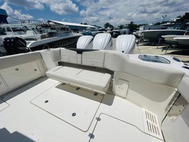 Slide: The Image of 2024 Sailfish 360 CC boat with spacious seating and storage. - 25