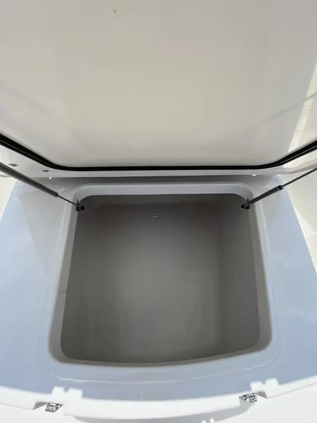 Slide: The Image of Open storage compartment of 2024 Sailfish 360 CC boat. - 30