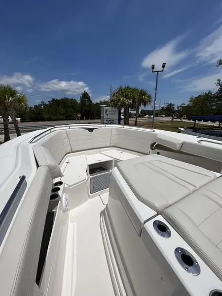 Slide: The Image of 2024 Sailfish 360 CC boat with spacious seating and modern design. - 35