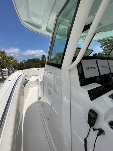 Slide: The Image of 2024 Sailfish 360 CC boat with Garmin navigation system. - 37