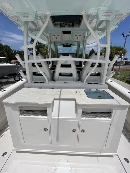 Slide: The Image of 2024 Sailfish 360 CC center console boat with seating and sink. - 44
