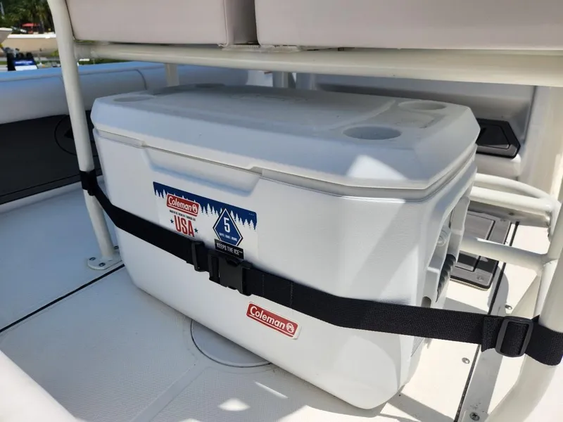 Slide: The Image of 2023 Sea Born FX22 Bay boat with Coleman cooler secured on deck. - 7