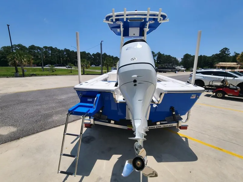 Slide: The Image of 2023 Sea Born FX22 Bay boat, rear view with outboard motor and ladder. - 8