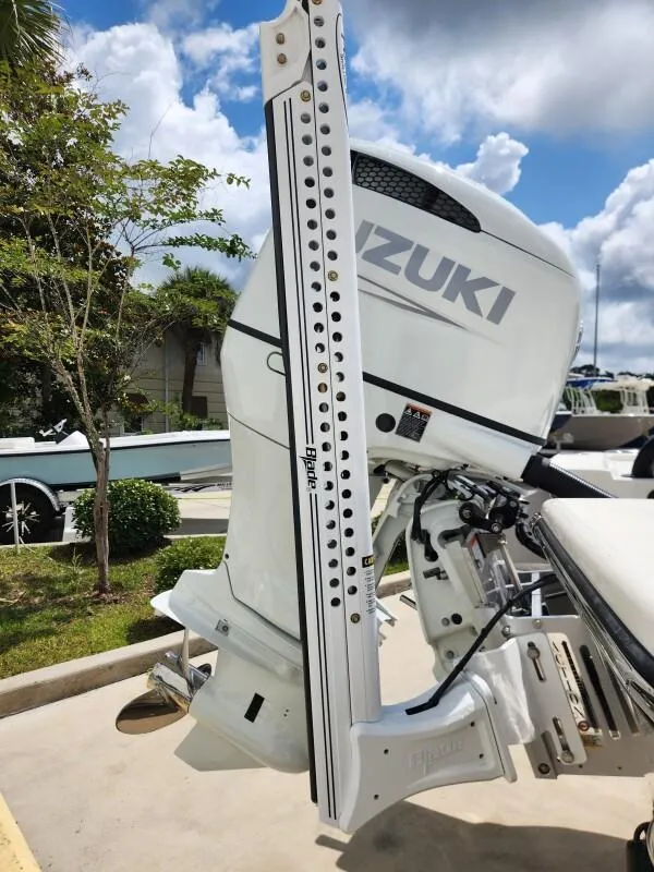 Slide: The Image of 2023 Sea Born FX24 Bay boat with Suzuki outboard motor. - 7