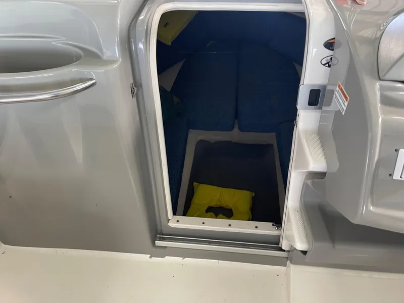 Slide: The Image of 2007 Bayliner 212 boat cabin entrance with interior view. - 10