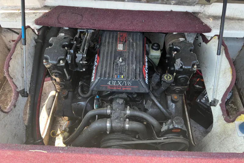 Slide: The Image of 1996 Maxum 1900 SR2 boat engine compartment with 4.3L V6 MerCruiser engine. - 12