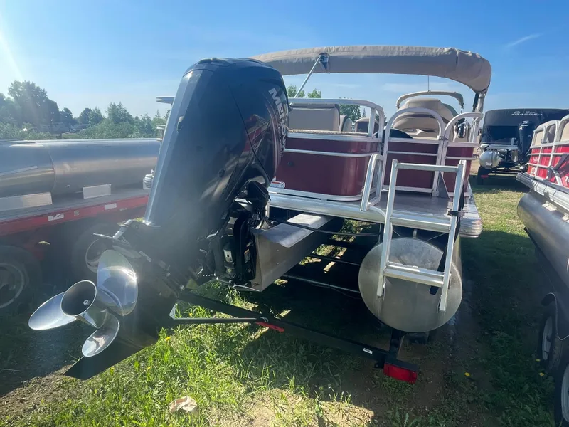 Slide: The Image of 2018 Sun Tracker Fishin' Barge 20 DLX pontoon boat with outboard motor. - 5