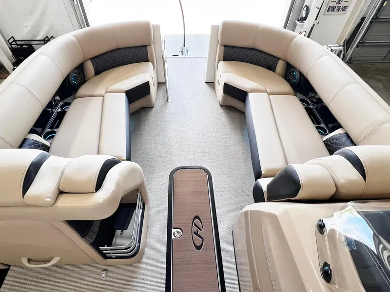 Slide: The Image of 2024 Harris Grand Mariner 230 interior with luxurious seating and modern design. - 24