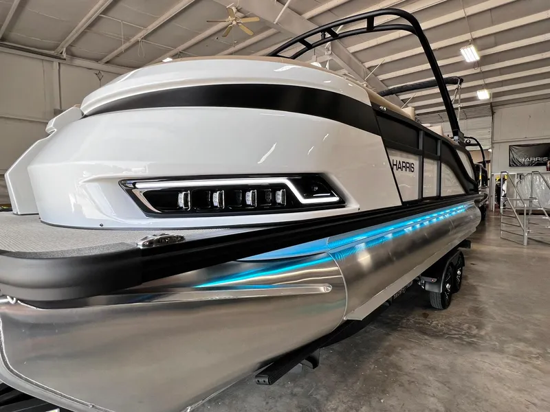Slide: The Image of 2024 Harris Grand Mariner 230 pontoon boat in showroom. - 3