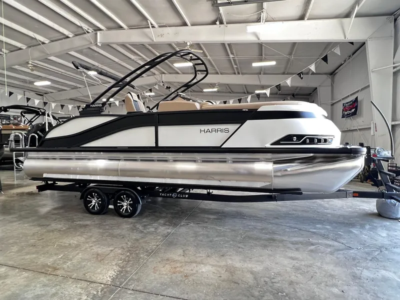 Slide: The Image of 2024 Harris Grand Mariner 230 pontoon boat in a showroom. - 32