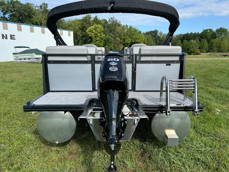 Slide: The Image of 2023 Qwest 820 RLS L pontoon boat with 60 HP engine, rear view. - 6