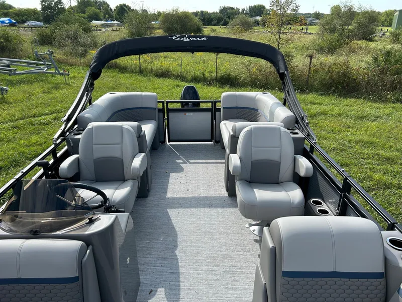 Slide: The Image of 2023 Qwest 820 RLS L pontoon boat with spacious seating and modern design. - 7
