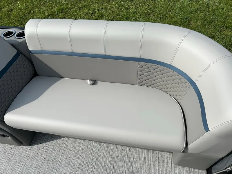 Slide: The Image of 2023 Qwest 820 RLS L boat seat with gray upholstery and blue accents. - 8