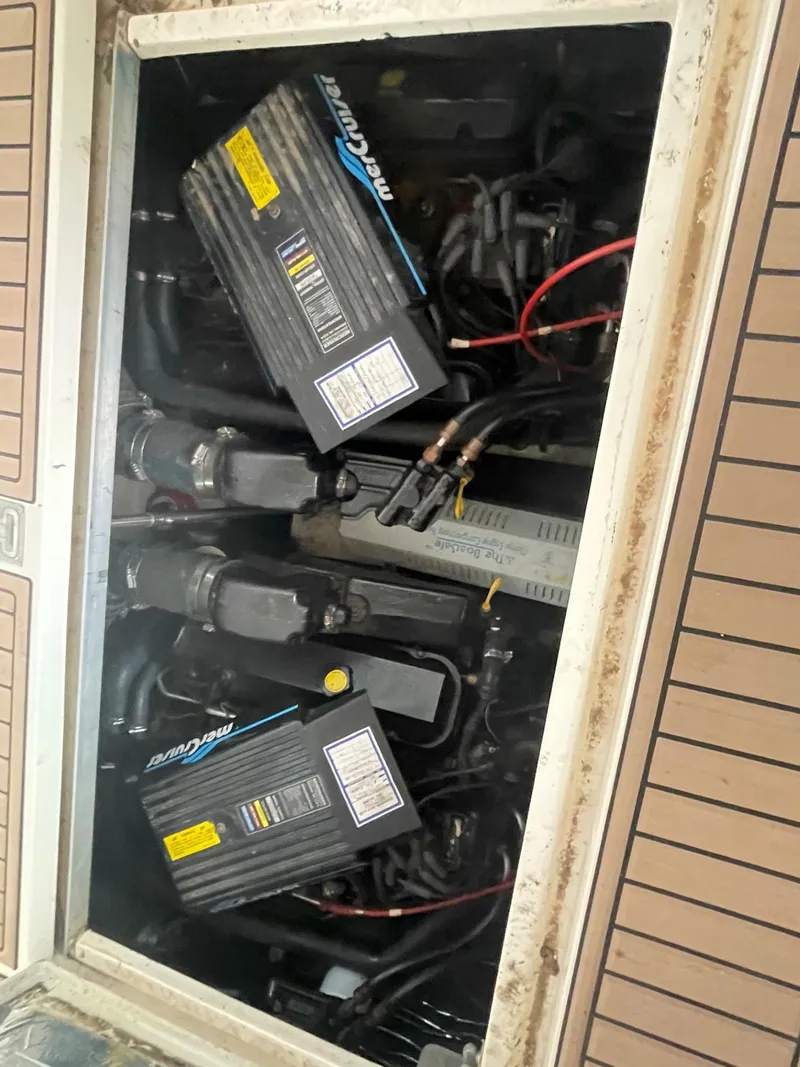 Slide: The Image of 1997 Cruisers Yachts 3375 Esprit engine compartment with twin MerCruiser engines. - 16