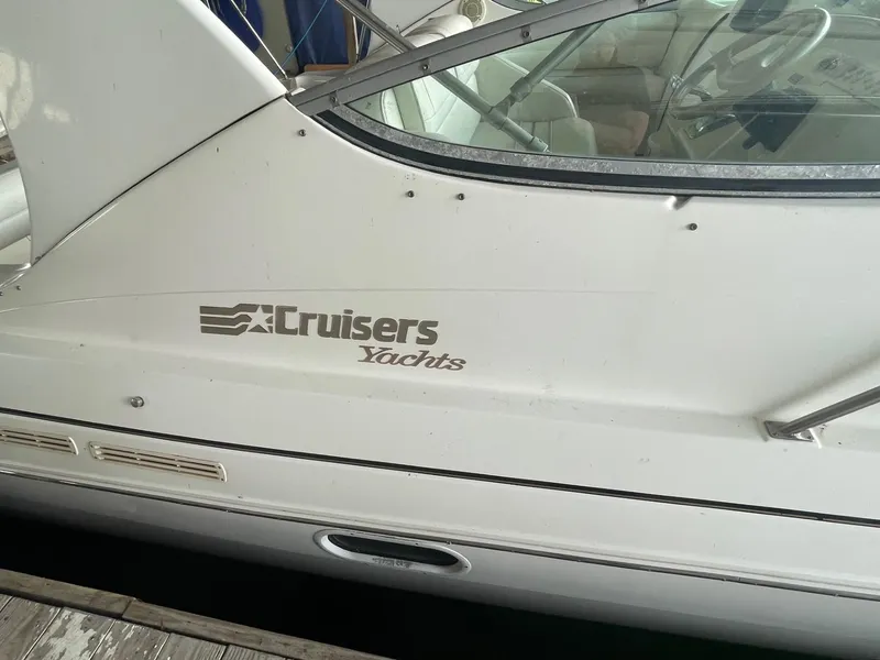Slide: The Image of 1997 Cruisers Yachts 3375 Esprit side view with logo. - 1