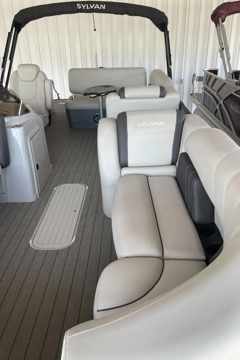 Slide: The Image of 2023 Sylvan Mirage X X5 CLZ pontoon boat interior with luxurious seating. - 8