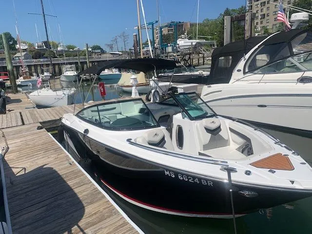 The Image of 2017 Monterey 258 SS boat docked at a marina with other boats. - 0
