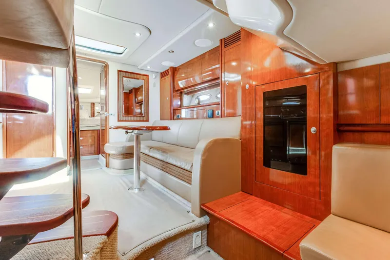 Slide: The Image of Luxurious interior of 2005 Sea Ray 390 Sundancer yacht with elegant wood finishes. - 30