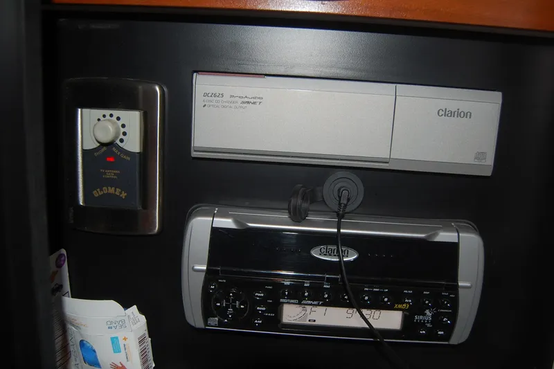 Slide: The Image of 2005 Sea Ray 390 Sundancer audio system with Clarion components and control panel. - 32