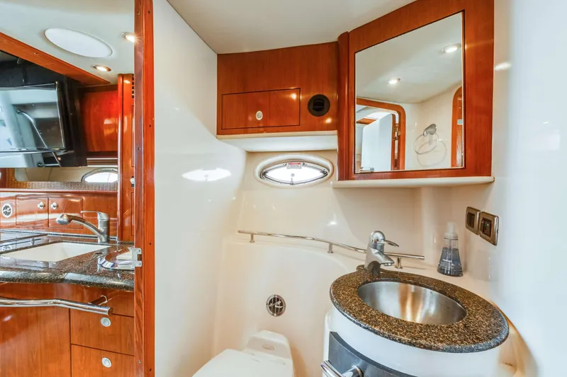 Slide: The Image of Luxurious bathroom interior of 2005 Sea Ray 390 Sundancer yacht with modern amenities. - 44