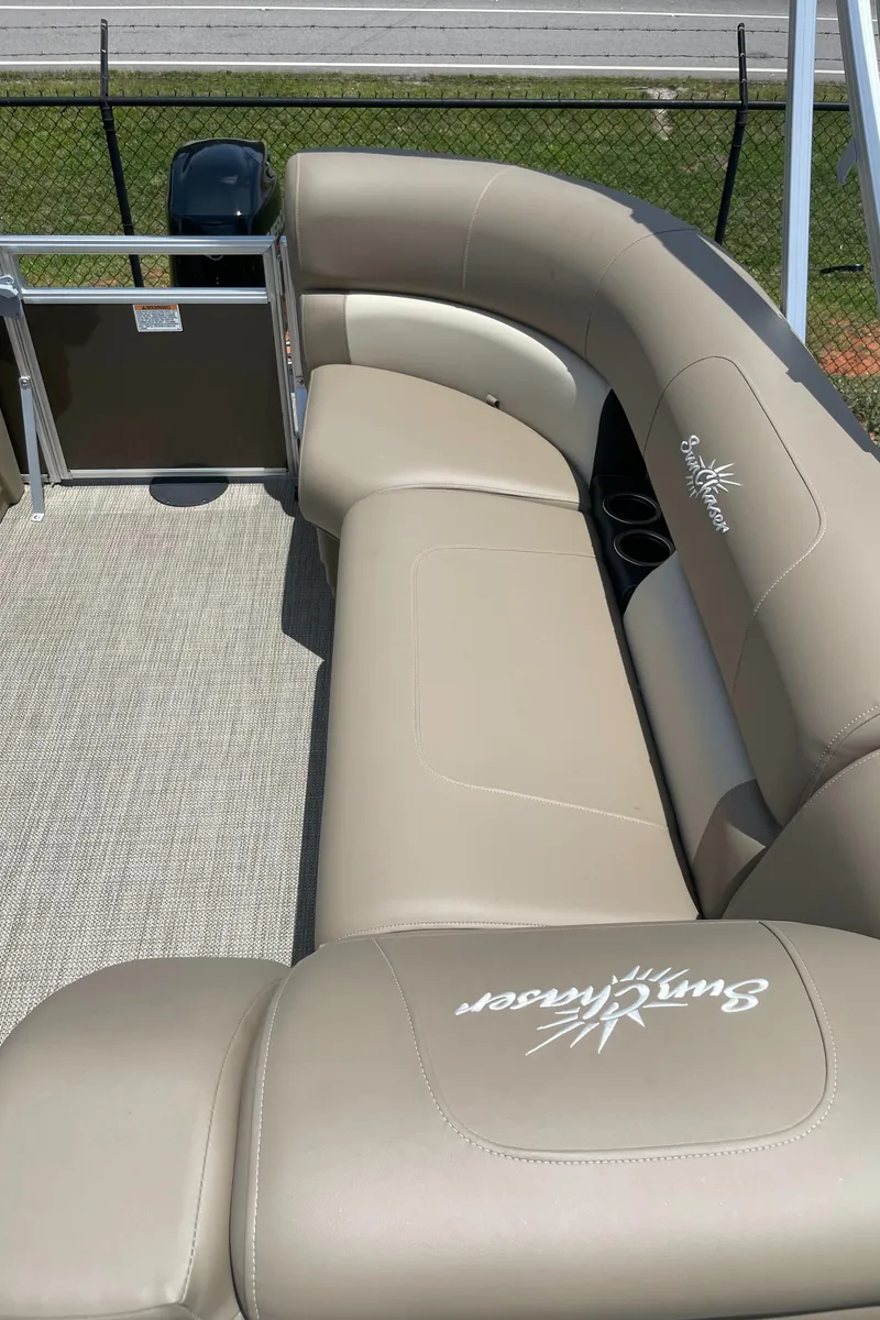 Slide: The Image of 2023 SunChaser Vista 18 LR pontoon boat with beige seating. - 6