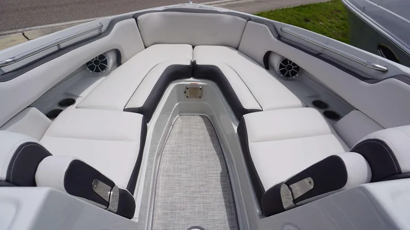 Slide: The Image of 2024 Crownline 290 XSS boat interior with white and black seating. - 7