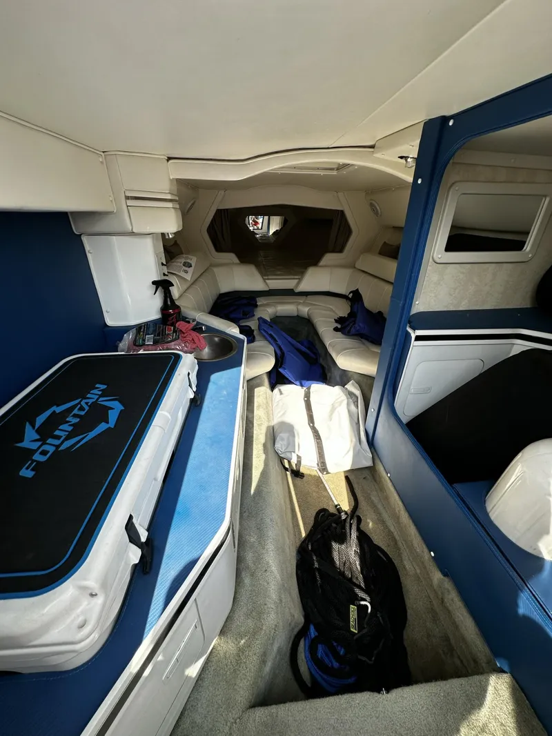 Slide: The Image of Interior of a 2002 Fountain 42 Lightning boat with seating and storage. - 13