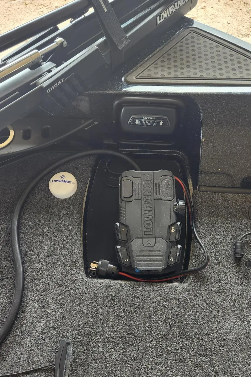 Slide: The Image of 2023 Nitro ZV20 Pro boat dashboard with Lowrance electronics and wiring. - 3