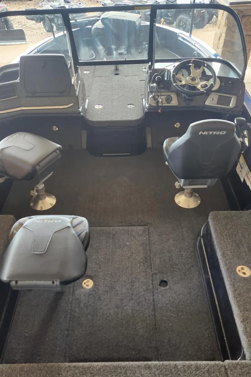Slide: The Image of Interior of 2023 Nitro ZV20 Pro fishing boat with seating and steering console. - 4