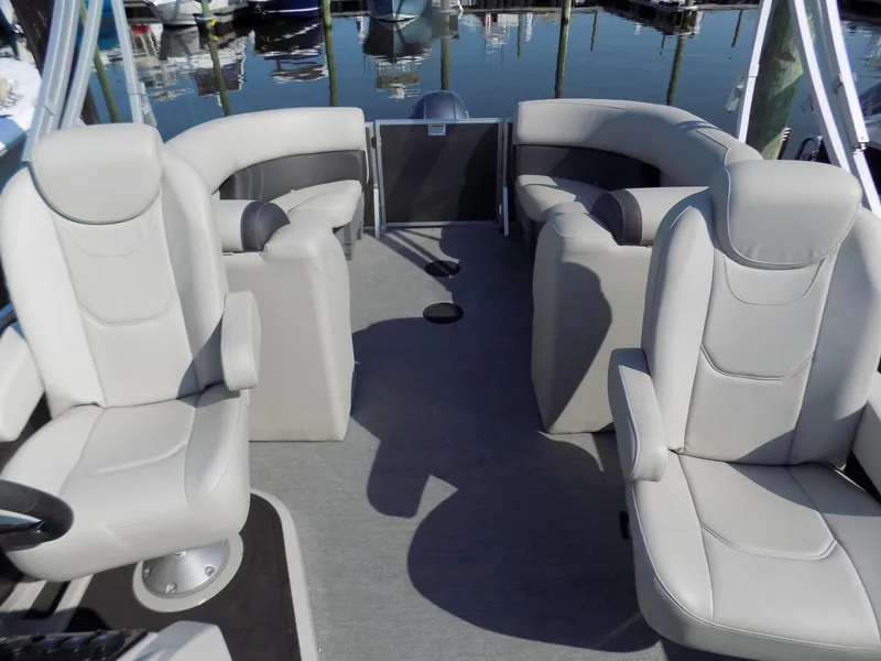 Slide: The Image of 2021 Sylvan Mirage 8522 LZ pontoon boat interior with plush seating and modern design. - 7
