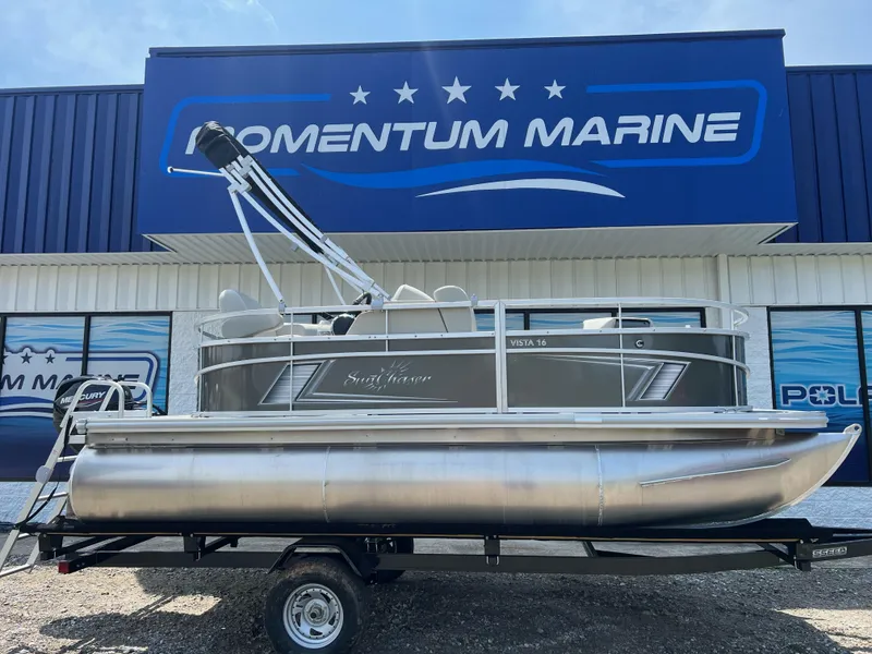 The Image of 2023 SunChaser Vista 16 Fish pontoon boat on trailer at Momentum Marine dealership. - 0