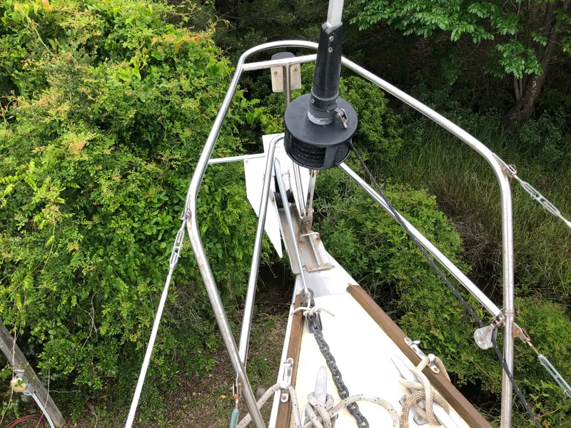 Slide: The Image of Aerial view of 1984 Morgan 454 sailboat surrounded by lush greenery. - 15